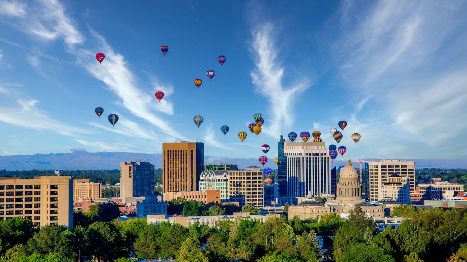 10 Things to Know Before Moving to Boise, Idaho. Aerial view of Boise with hot air balloons.